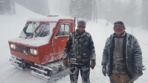 two men in snowstorm